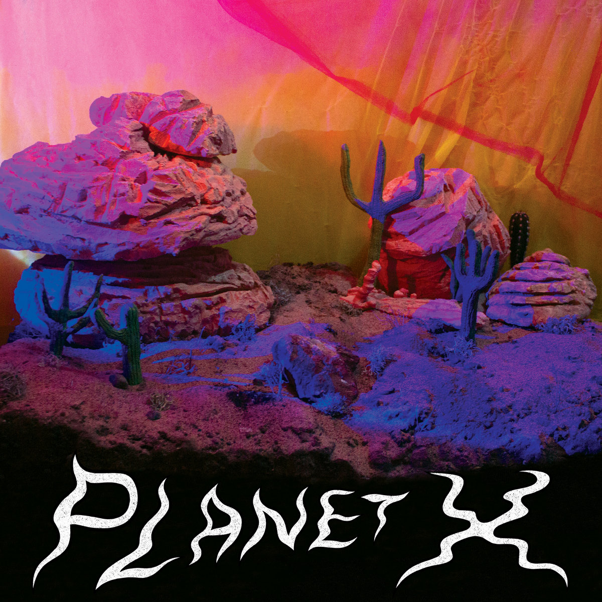 PlanetX_RedRibbon_2021